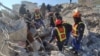 Rescuers search the rubble for survivors following a February 9 earthquake in Turkey.