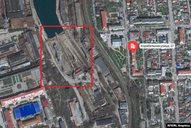 The aftermath of Ukraine's September 2023 strike on the docks of Sevastopol, showing the proximity of one of the damaged buildings to the impact site