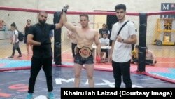 خیر الله لعل زاد که در رقابت های ایران برنده کمربند قهرمانی شد