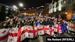 Demonstrators march on Pushkini Street in Tbilisi on May 3 against the so-called foreign-agent bill.