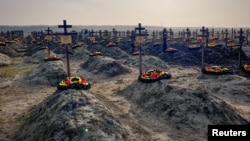 Graves of Russian Wagner mercenaries are seen at a cemetery near the village of Bakinskaya in the Krasnodar region, Russia, in January 2023.