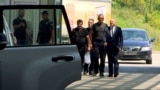 KOSOVO -- Video grab -- Relesed policemen returning to Kosovo