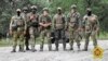 Na fotografiji koju je bjelorusko Ministarstvo odbrane objavilo 20. jula, bjeloruske specijalne snage i plaćenici poziraju tokom manevara u blizini pograničnog grada Bresta.