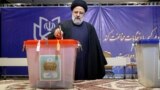Iranian President Ebrahim Raisi casts his vote during parliamentary elections in Tehran on March 1. “The Islamic republic is now a minority-ruled unconstitutional theocracy,” one Iran expert says.