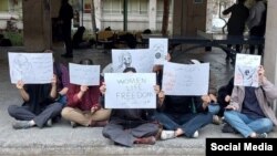 A group of female students protest at Tehran University of Art on March 7.