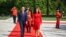 Kosovar President Vjosa Osmani (right) walks with Albanian President Bajram Begaj during her official visit to Tirana on September 4.