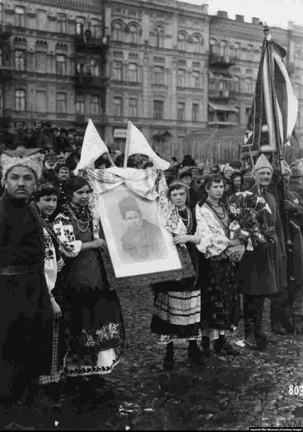Ukrainians during the German occupation in 1918 hold a portrait of Taras Shevchenko in central Kyiv. Shevchenko was a Ukrainian-language poet and figurehead for Ukrainian independence movements.&nbsp;