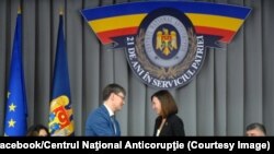 Șefa Procuraturii Anticorupție Veronica Dragalin și directorul CNA, Iulian Rusu.