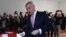 President Milo Djukanovic casts his vote in Montenegro's presidential election on March 19. 