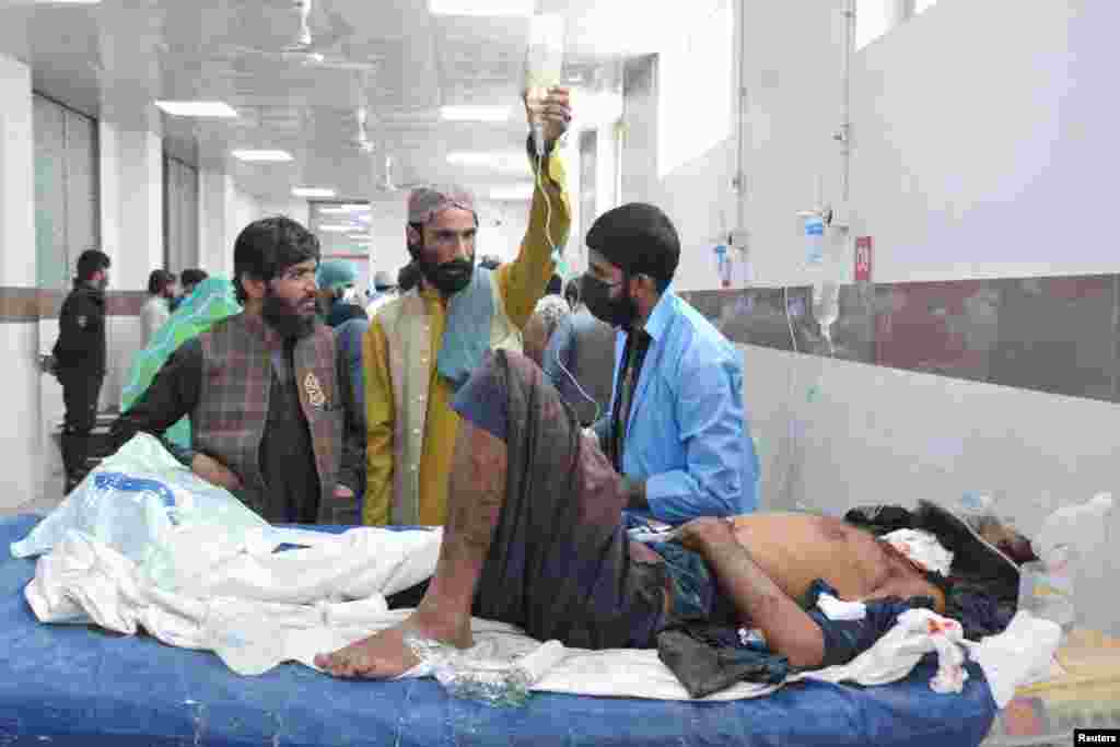 An injured man receives treatment at a hospital in Quetta. Both Balochistan and Khyber Pakhtunkhwa provinces border Afghanistan and have suffered attacks by Islamist militants in recent years.
