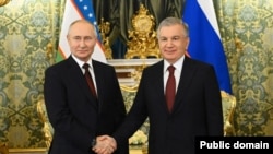 Президенты Шавкат Мирзияев и Владимир Путин. Москва, Кремль, 6 октября 2023 года. (Фото пресс-службы президента Узбекистана).