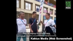 Uzbek boxing coach Akmal Hasanov (right) with Kyrgyz boxer Munarbek Seiitbek-uulu (center).