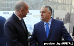 Bulgarian President Rumen Radev speaks with Hungarian Prime Minister Victor Orban in Budapest in May.