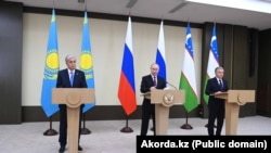 RUSSIA — From left to right: Kazakh President Kassym-Jomart Tokayev, Russian President Vladimir Putin, and Uzbek President Shavkat Mirziyoyev. Moscow, October 7, 2023. 