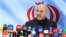 Mohammad Baqer Qalibaf addresses the media after registering to run in the presidential election in Tehran on June 4.