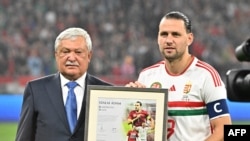 Hungarian footballer Adam Szalai (right) after his last international match in 2022