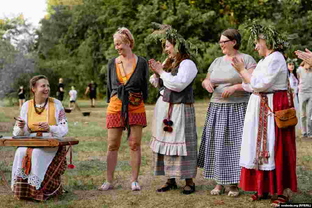Exiled Belarusians gather to hear traditional music during an Ivan Kupala celebration that was held in Vilnius on June 29.&nbsp; The celebration combines the Orthodox feast of St. John the Baptist with the summer solstice -- the longest day of the year -- drawing on ancient pagan and Slavic traditions.