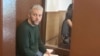 Sergei Vedel appears in court in Moscow in April 2023.