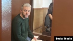 Sergei Vedel appears in court in Moscow in April 2023.