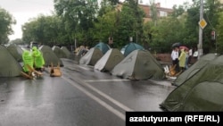 Archbishop Bagrat Galstanian's anti-government supporters camp out on Baghramian Avenue next to the Armenian parliament in Yerevan on June 10.