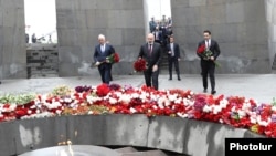 Armenian Prime Minister Nikol Pashinian (in the center) visits the Genocide Memorial in Yerevan, April 24, 2023.