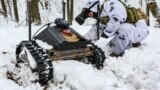 A Russian soldier tests a ground drone in Ukraine's Donetsk region in February. 