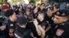 A scuffle between police officers and members of the Crusaders group protesting in Republic Square, Yerevan, August 8, 2023.