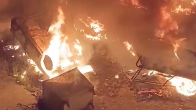 Mob In Pakistan Drags Burning Body Of 'Blasphemer' Through Streets In Swat Valley