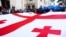 Під час протестів в Грузії, окрім державних прапорів, багато також прапорів і ЄС 