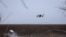 (File photo) A military drone flies over the steeps near the frontline village of Robotyne in Ukraine’s Zaporizhzhya region.