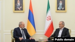 Iran's new President Masoud Pezeshkian meets Armenian Prime Minister Nikol Pashinian in Tehran, July 30, 2024.