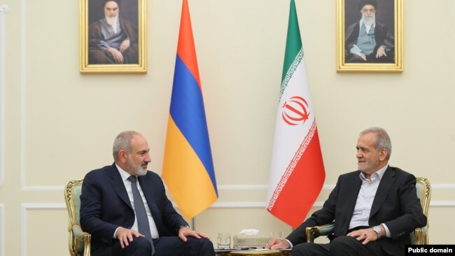 Iran's new President Masoud Pezeshkian meets Armenian Prime Minister Nikol Pashinian in Tehran, July 30, 2024.