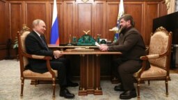 Глава Чечни Рамзан Кадыров на встрече с президентом России Владимиром Путиным. Кремль. 13 марта 2022 года 