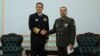 از راست: محمدرضا آشتیانی وزیر دفاع ایران و دنگ جون، وزیر دفاع چین