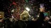 Граждани празнуват пред парламента в Атина, след като гръцките депутати одобриха еднополовите бракове късно вечерта на 15 февруари