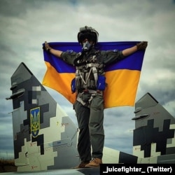 Андрей Пильщиков с флагом Украины. Архивное фото