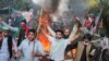 Followers of Pakistan&rsquo;s main political party, Pakistan Tehrik-e Insaf (PTI), clashed with police on March 14 outside the residence of party chairman and former Prime Minister Imran Khan in eastern Lahore after police arrived to arrest him.<br />
<br />
&nbsp;