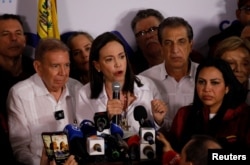  Опозиционната лидерка Мария Корина Мачадо и претендентът за президент на опозицията Едмундо Гонсалес в общо изказване след изборите, 29 юли 2024 година 