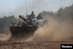 Британський танк «Челенджер» з Королівського реджименту 12 Механізованої бригади Британської армії під час навчань НАТО у Польщі. Травень 2024 року (фото ілюстраційне)