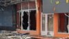 Пошкоджені вітрини магазинів після обстрілу в Херсоні