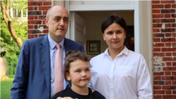 Jamie Fly, Kateryna Yesypenko, and Stefania Yesypenko at the Ukraine House in Washington, D.C. on May 18, 2023.