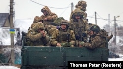 Украинские военные в Донецкой области, декабрь 2023 года. Фото: Reuters