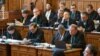 Defense lawyers attend a trial of one of the largest recent corruption cases in Hungary in Budapest on February 17.