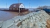 One of four dams hold back water to keep the Beskol village from flooding in the Kyzylzhar district of northern Kazakhstan on April 17.