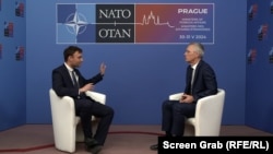 RFE/RL's Rikard Jozwiak interviews NATO Secretary-General Jens Stoltenberg at a NATO foreign ministers' meeting in Prague on May 31.