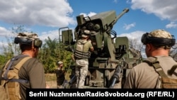 Ukrainian soldiers prepare to fire from the 2C22 Bohdan self-propelled howitzer toward Russian positions in eastern Ukraine.