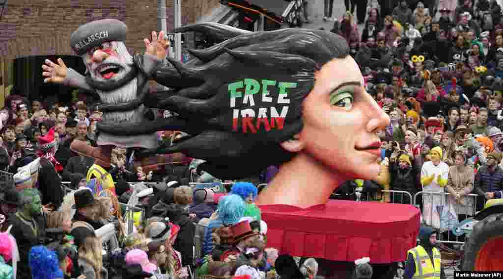 A carnival float depicts the fight for freedom in Iran during the traditional carnival parade in Dusseldorf, Germany.