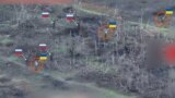 Drone Footage Appears To Show Russian Soldiers Using Ukrainian POWs As Human Shields GRAB