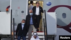 Siamak Namazi, Morad Tahbaz dhe Emad Shargi, pas aterimit në Doha të Katarit. 