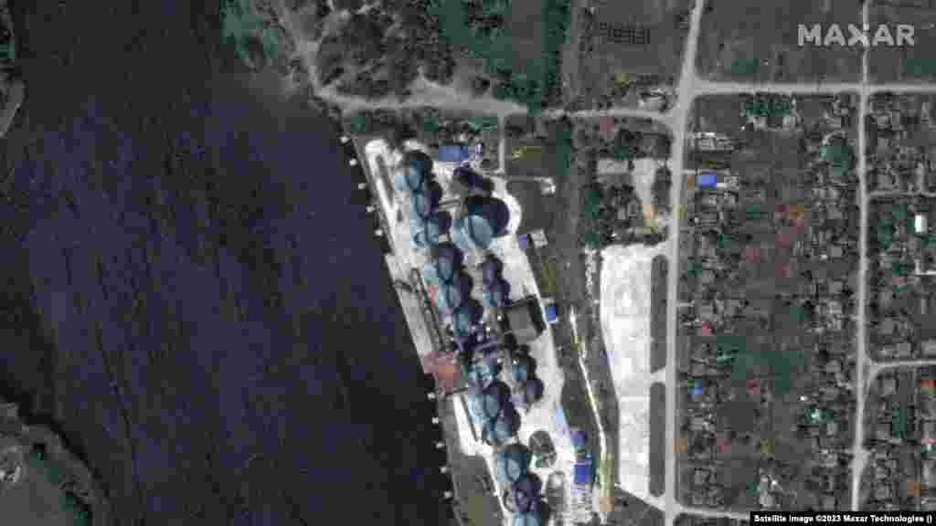 A view of the granary in Nova Kakhovka on June 5 and following the inundation on June 7.